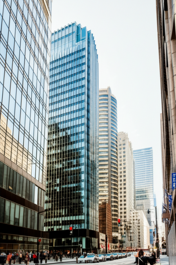 Photo of business district in a major US city, showing office buildings where many companies need business insurance